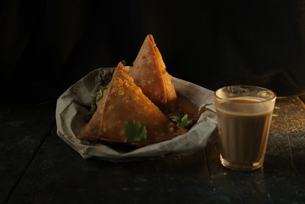 Vegetable samosas with a cup of chai